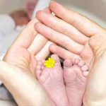 новородено в църква